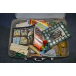 Suitcase and Contents of Christmas Lights, Books,