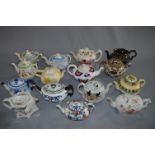 Collection of Fifteen Decorative Tea Pots