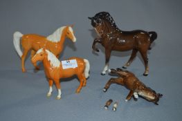 Four Beswick Figurines - Horses (At Fault)