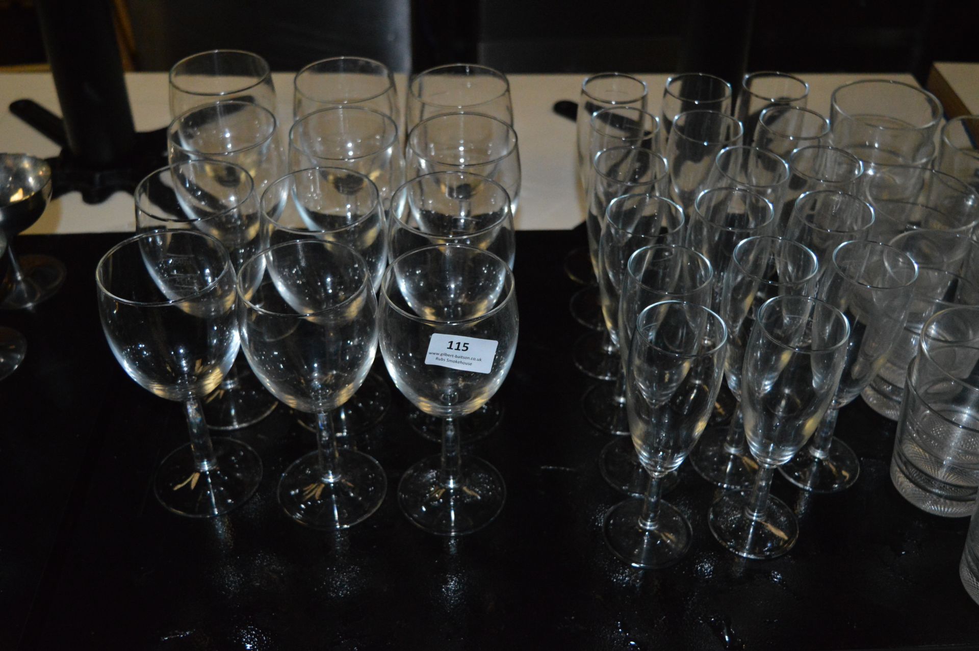 *Twelve Wine Wine Glasses and Sixteen Flutes