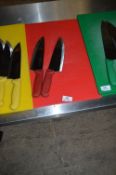 *Red Chopping Board and Two Red Handled Chef's Kni