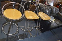 Three Chrome and Beech Seated Barstools