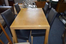 Light Oak Dining Table and Four Leatherette Dining