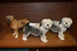 Three Coopercraft Pottery Dog Ornaments