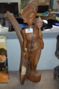 Carved Wood Indian Goddess Figurine and a Boomeran