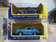 Two Motormax 1:24 Diecast Model Vehicles