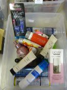 Storage Tub Containing Various Cosmetics, Hair Spr