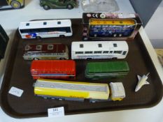 Six Diecast Model Buses and a Shell Truck