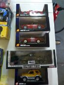Four Diecast Model Vehicles and One Military Vehic