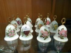 Collection of Twelve Floral Decorated Pottery Bell