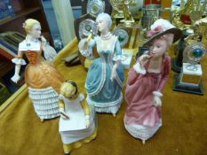 Collection of Four Porcelain Figurines