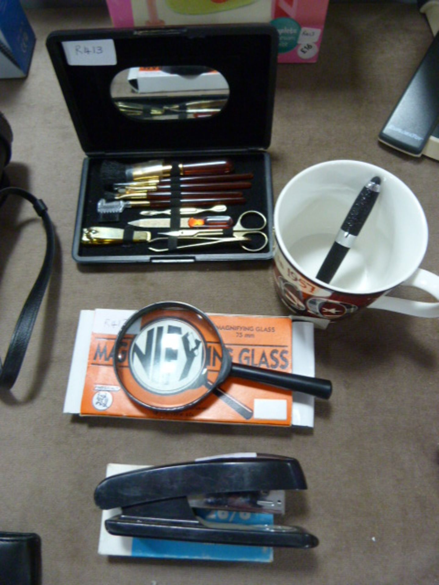 Manicure Set, Staple Gun, Magnifying Glass and a M