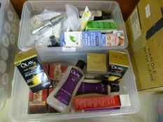 Two Small Storage Tubs Containing Olay Skin Produc