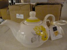 *Two Yellow Floral Patterned Teapot & Mugs Sets