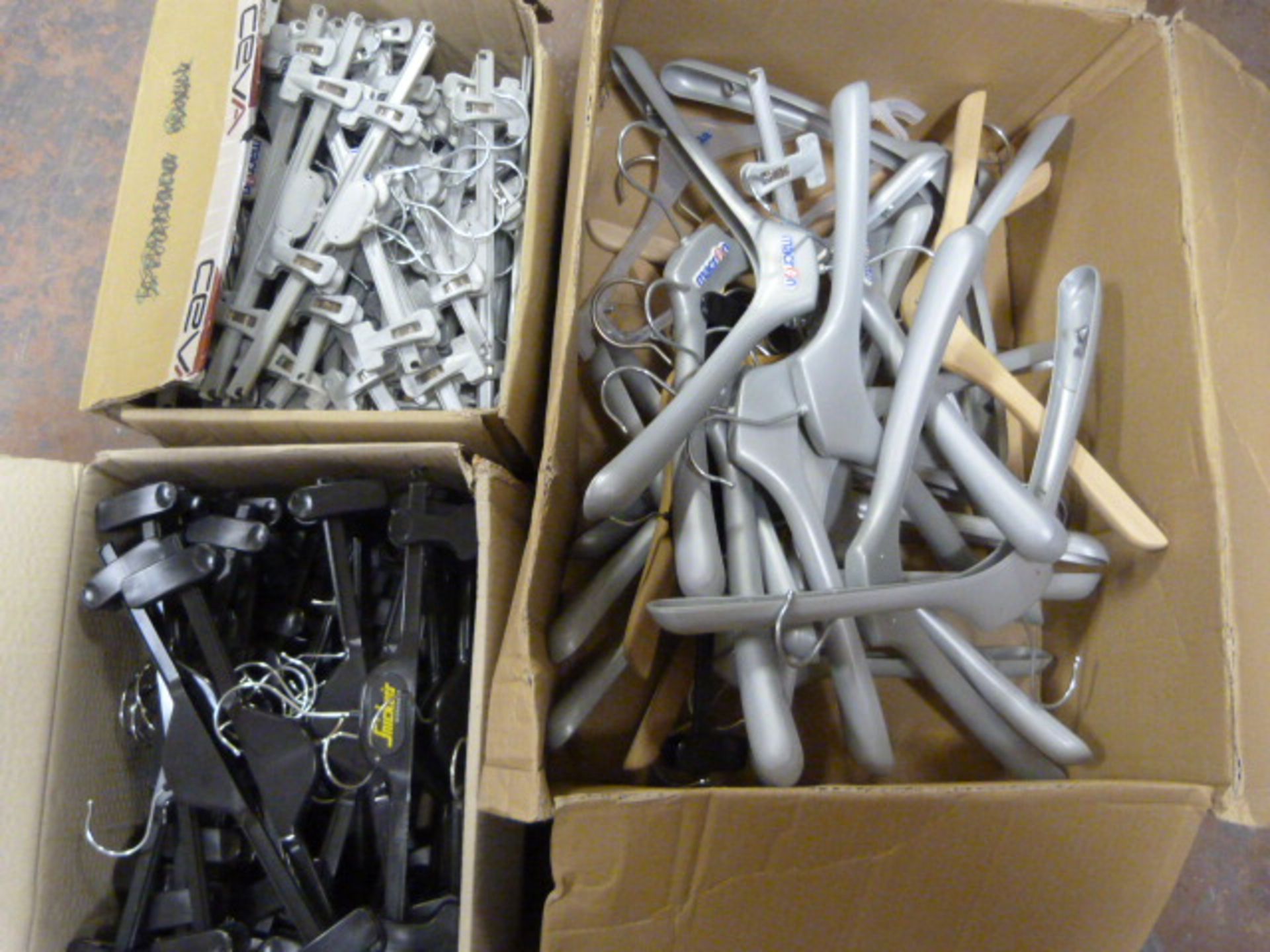 *Three Boxes of Clothes Hangers (Grey & Black)