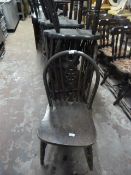 Eleven Wheel Back Dining Chairs