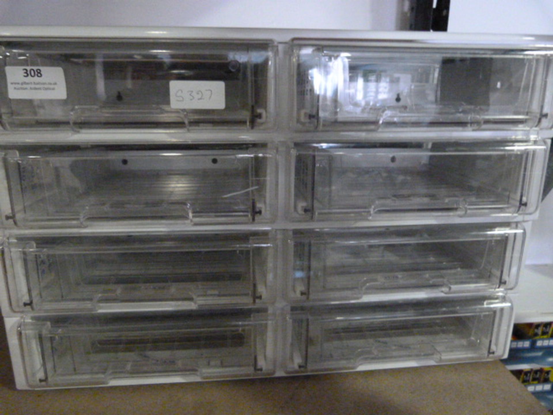 *Two Sets of Eight Perspex Drawers