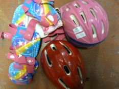 Bag Containing Two Girls Bicycle Helmets and Vario