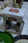 Stella Artois - Four Bottles and a Glass
