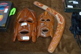 Two Carved Wood Masks and a Boomerang