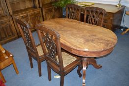 Oval Walnut Twin Pedestal Dining Table and Four Ca