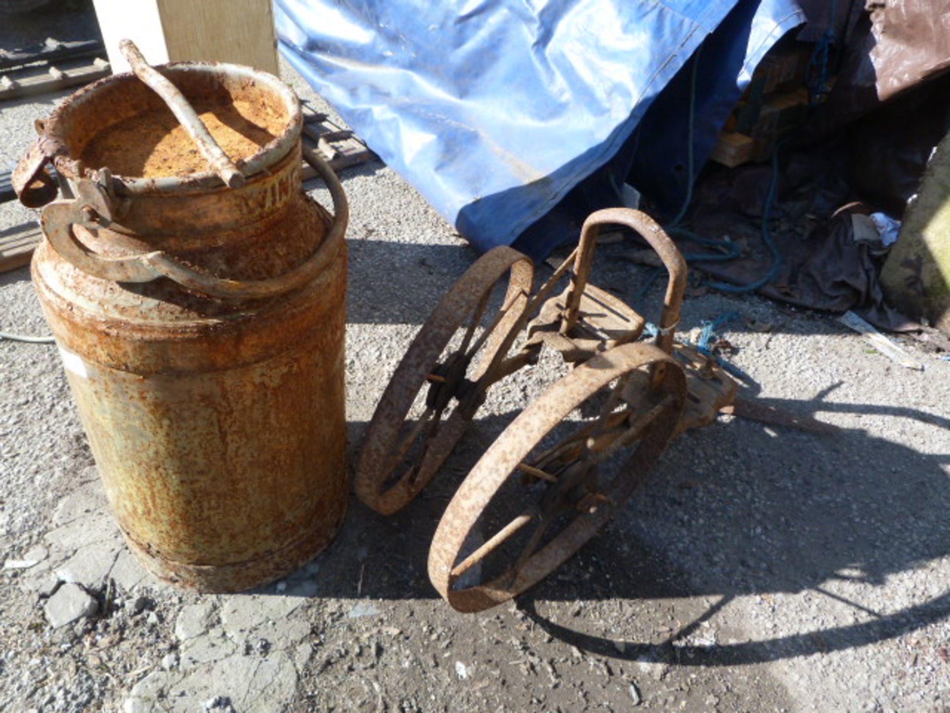 Small Iron Milk Churn and an Iron Flower