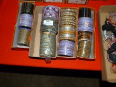 Four Boxes of Assorted Asian and Costume Bangles