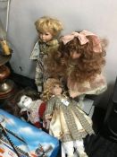 Collection of Four Porcelain Headed Dolls