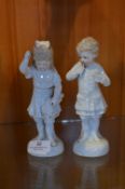 Pair of Pottery Figurines - Boy and Girl