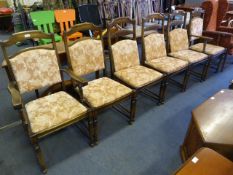 Set of Four Oak Dining Chairs and Two Carves with