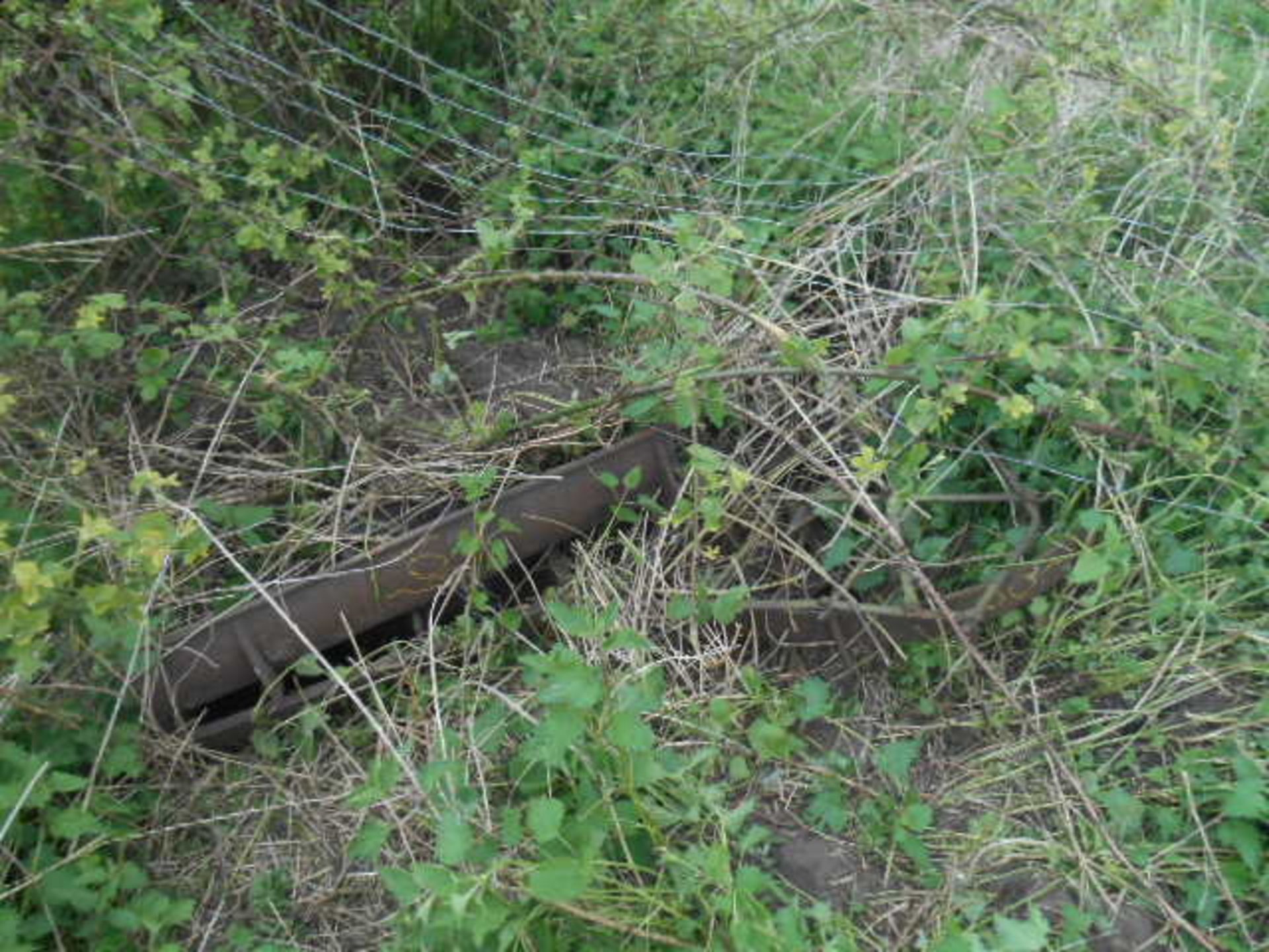 Two Iron Pig Troughs, Harrows and an Iron Wheel