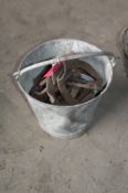 Galvanised Bucket Containing Horseshoe