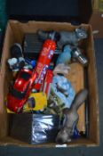 Box Containing Model Toy Cars, DVD Cases, Chopping