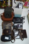 Collection of Vintage Cameras Including Kodak, Oly