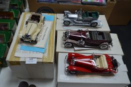 Four Franklin Mint Diecast Model Vehicles - Jaguar