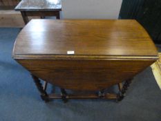 Oak Oval Topped Drop Leaf Dining Table on Barley T