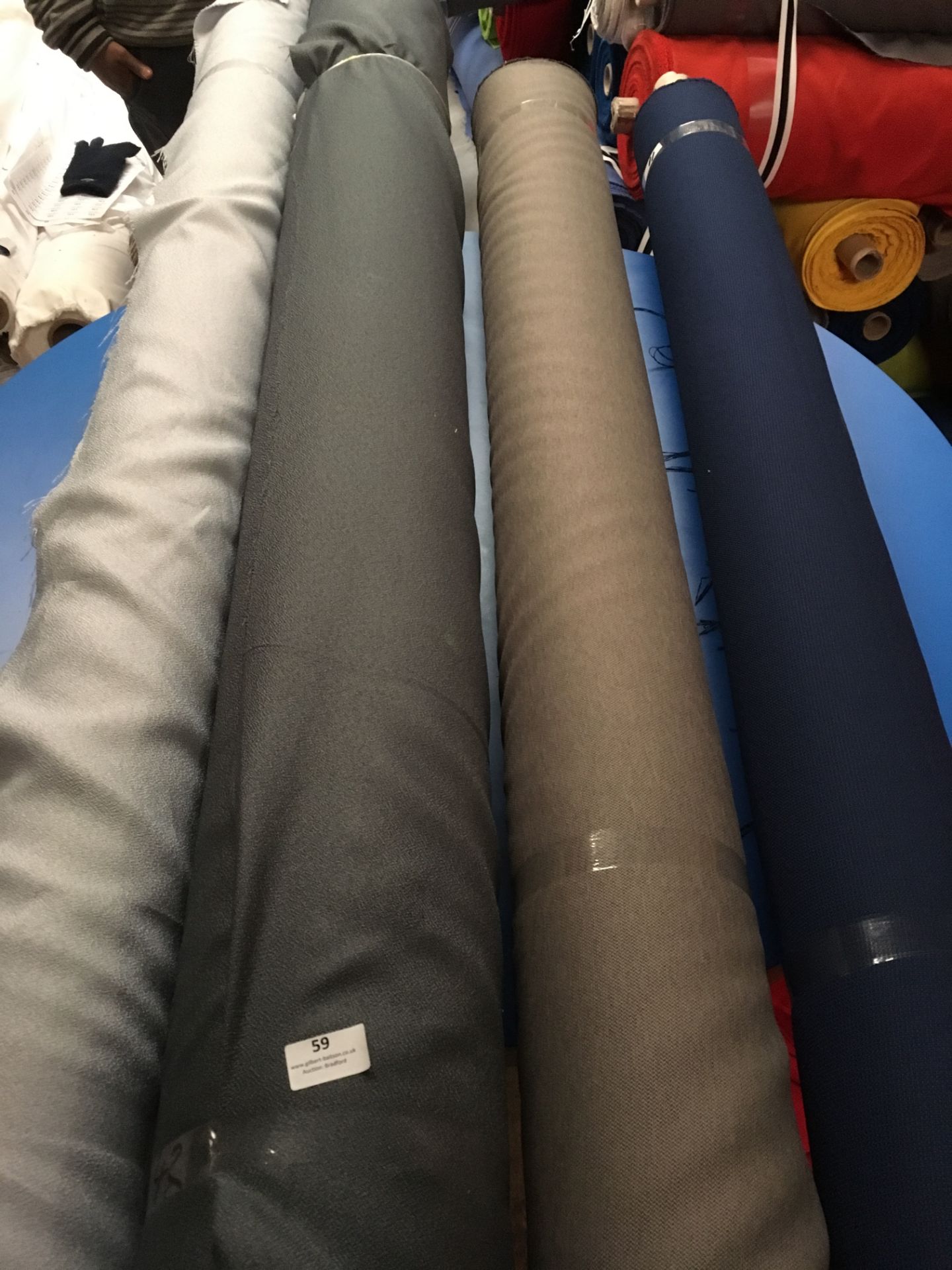 Four Rolls of Polyester Crepe Fabric Assorted Colours and Lengths