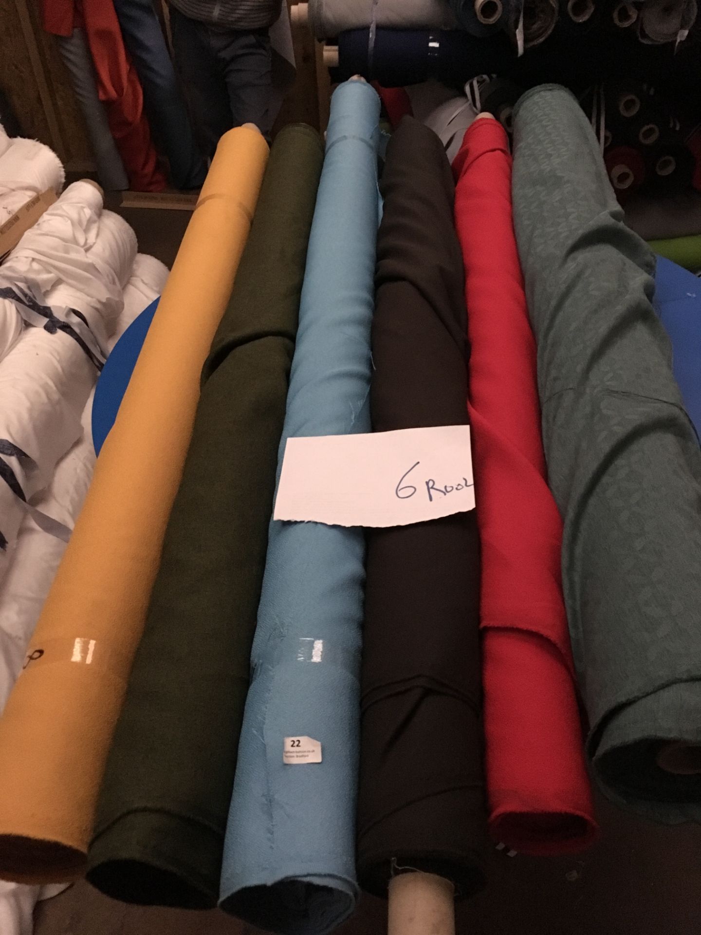 Four Rolls of Polyester Crepe Fabric Assorted Colours and Lengths