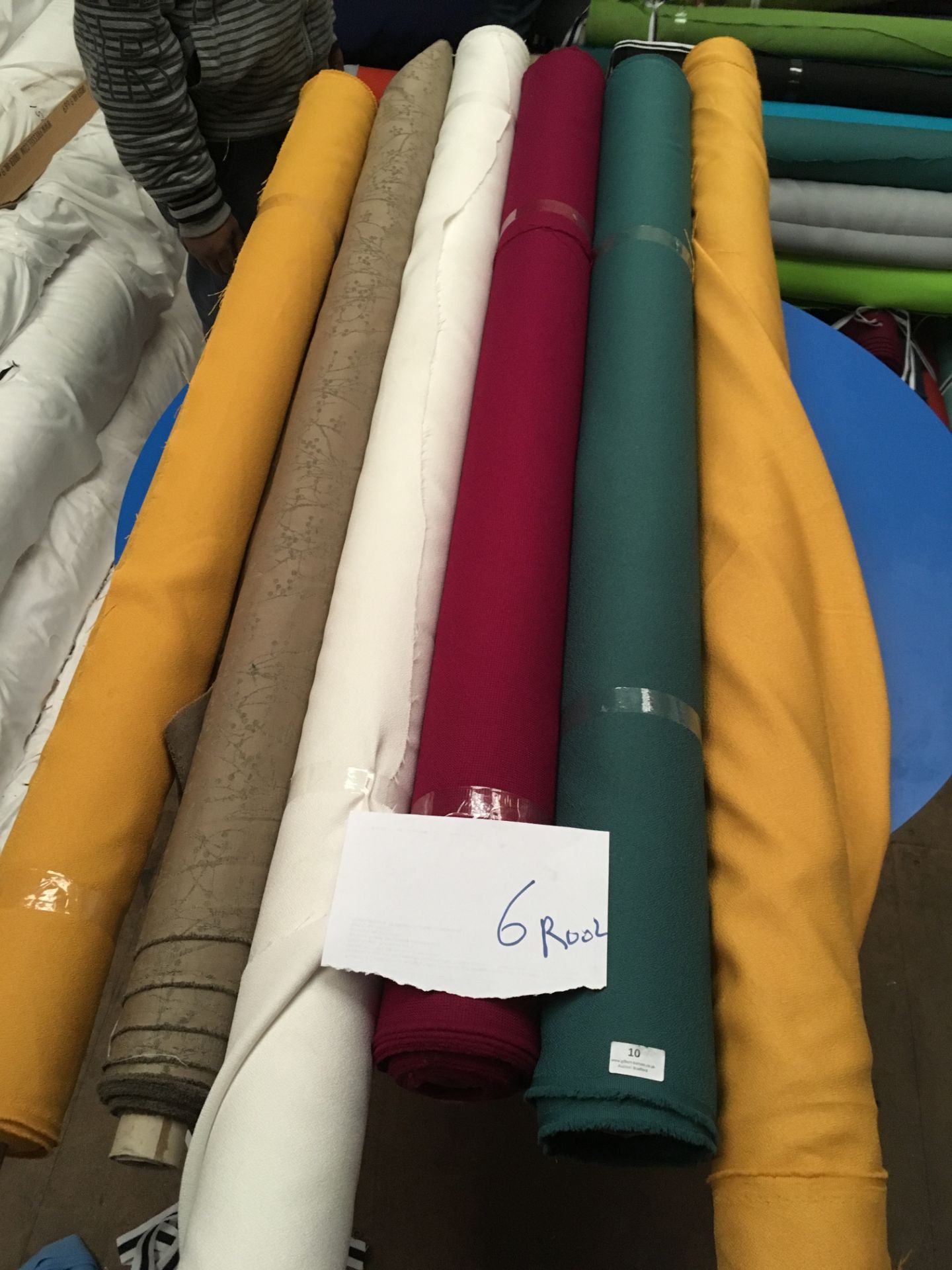 Four Rolls of Polyester Crepe Fabric Assorted Colours and Lengths