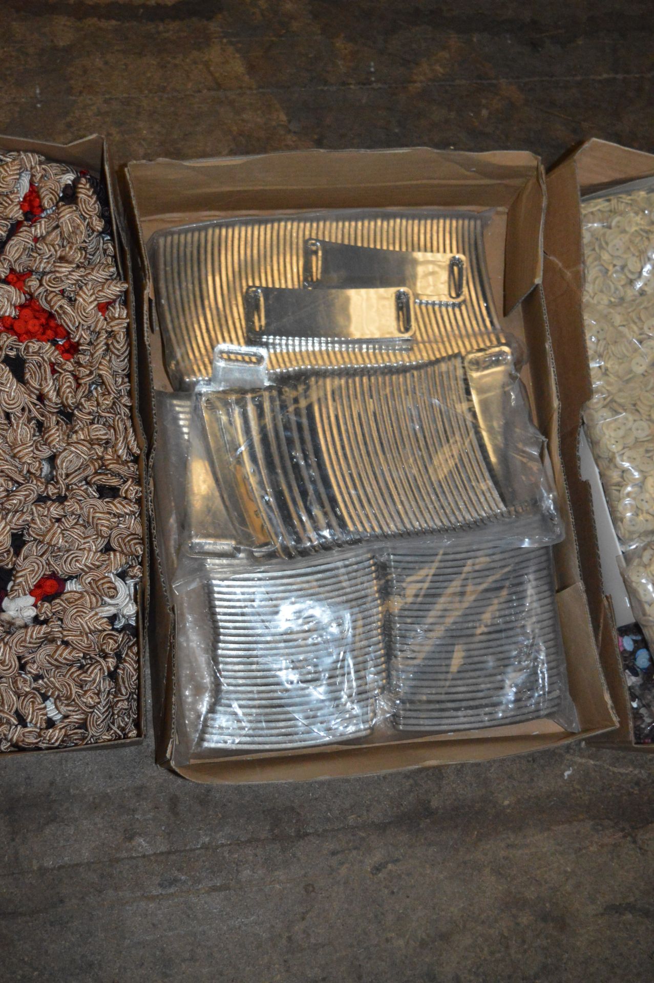 Box Containing Two Bags of Chrome Effect Buckles