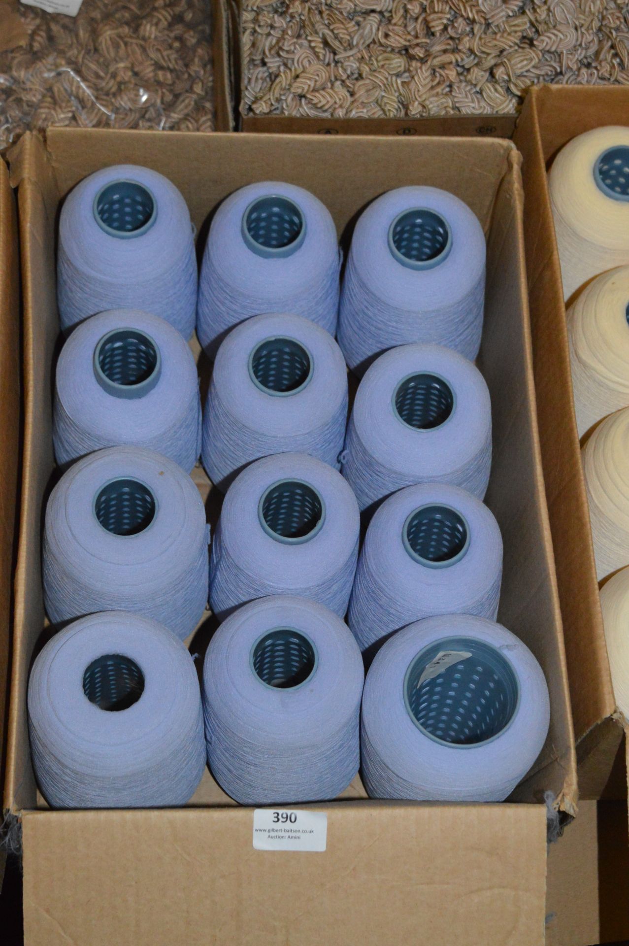 Twelve Cones of Lilac Polyester Thread