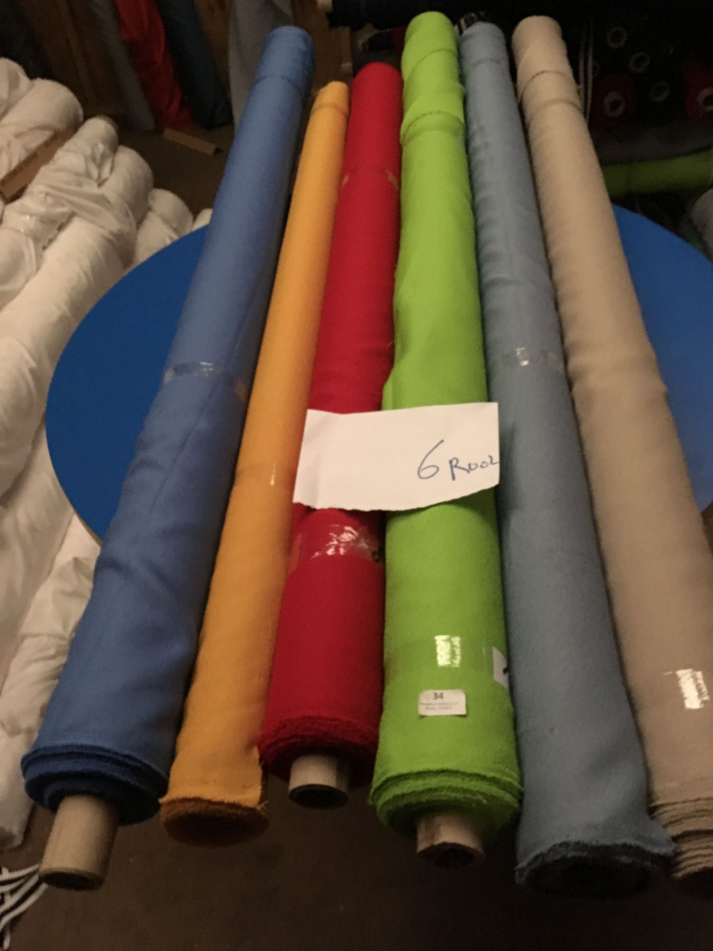 Four Rolls of Polyester Crepe Fabric Assorted Colours and Lengths