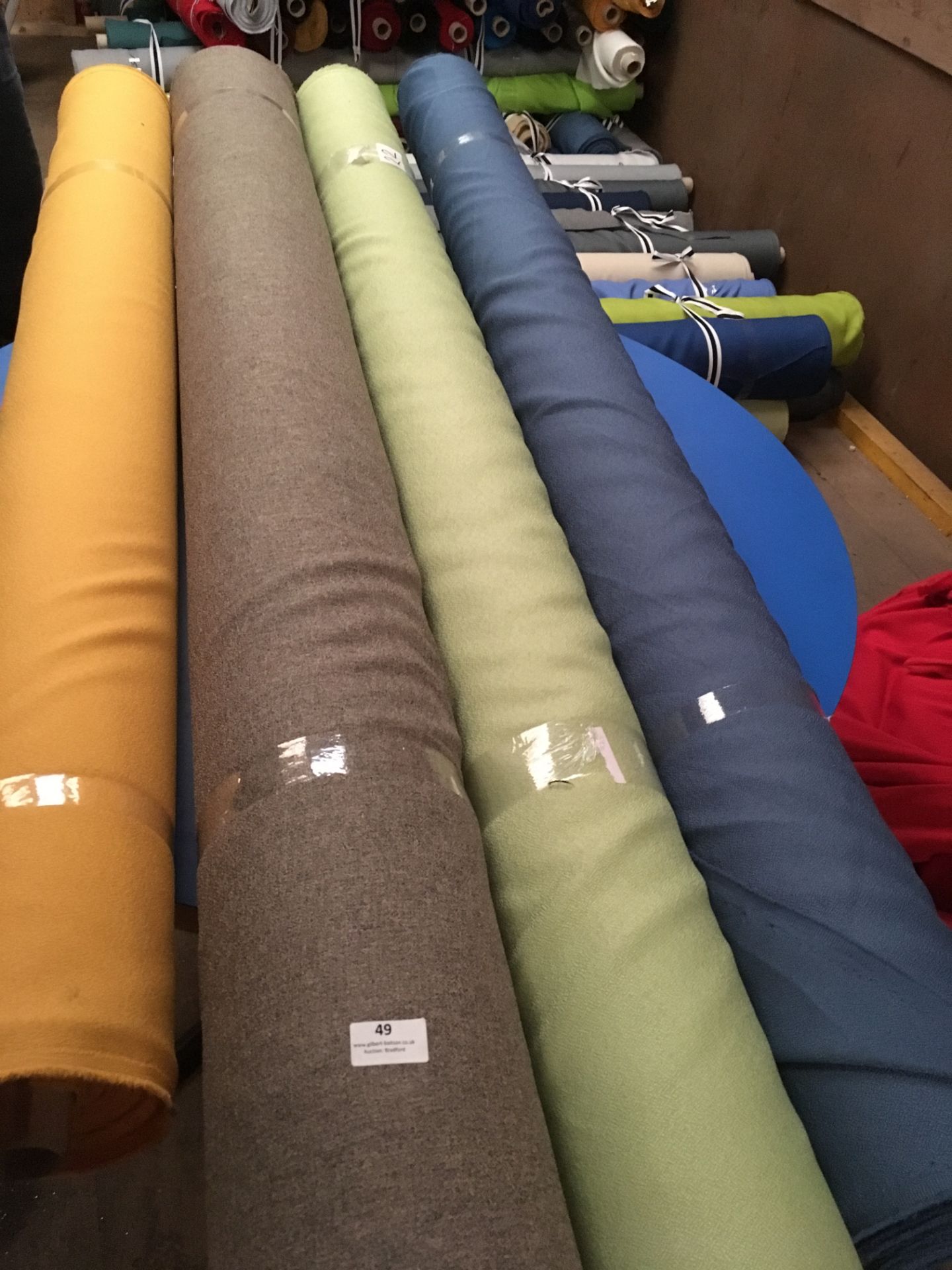 Four Rolls of Polyester Crepe Fabric Assorted Colours and Lengths