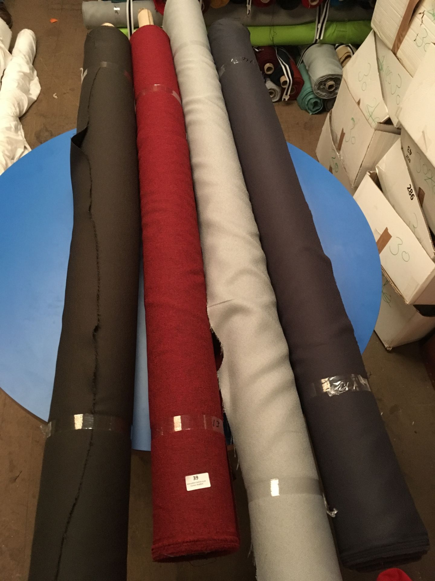 Four Rolls of Polyester Crepe Fabric Assorted Colours and Lengths