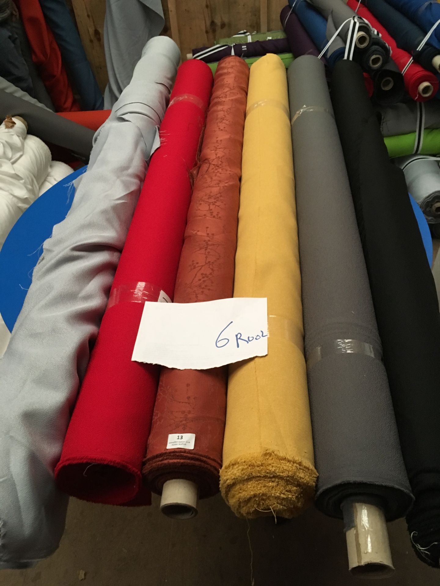 Four Rolls of Polyester Crepe Fabric Assorted Colours and Lengths