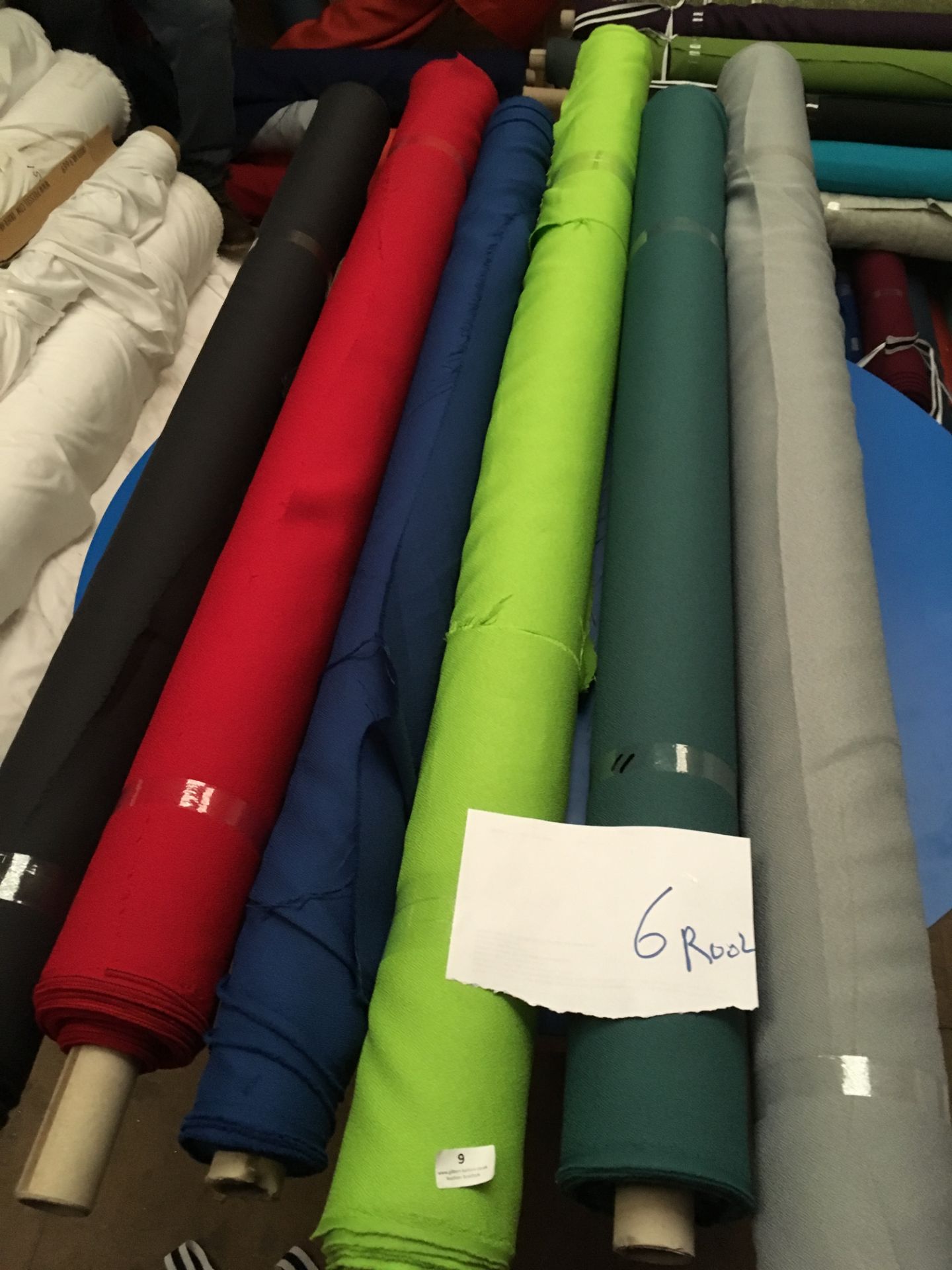 Four Rolls of Polyester Crepe Fabric Assorted Colours and Lengths