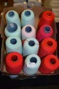 Twelve Cones of Assorted Polyester Threads