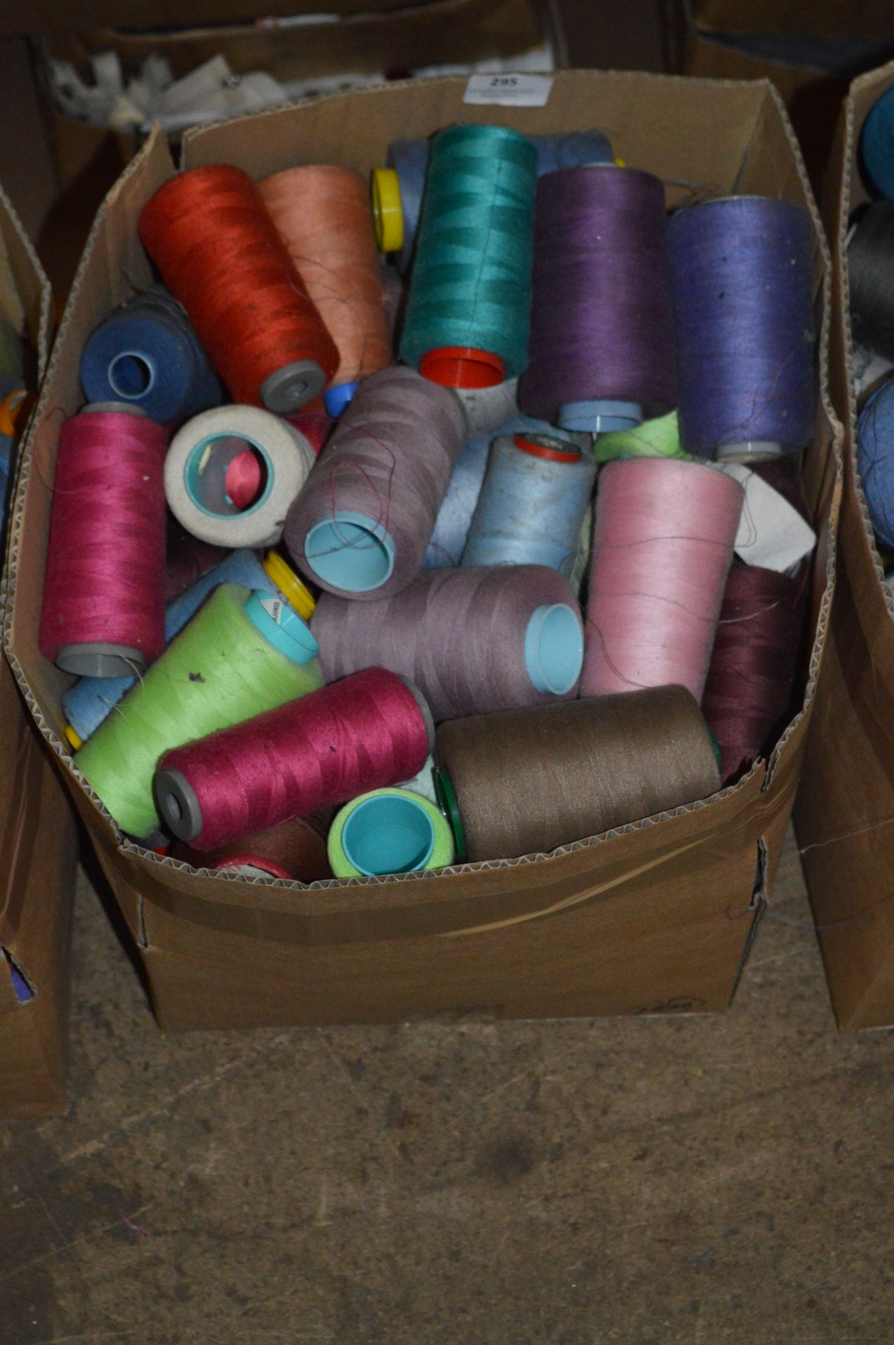 Box Containing Assorted Cones of 120 Cotton Thread