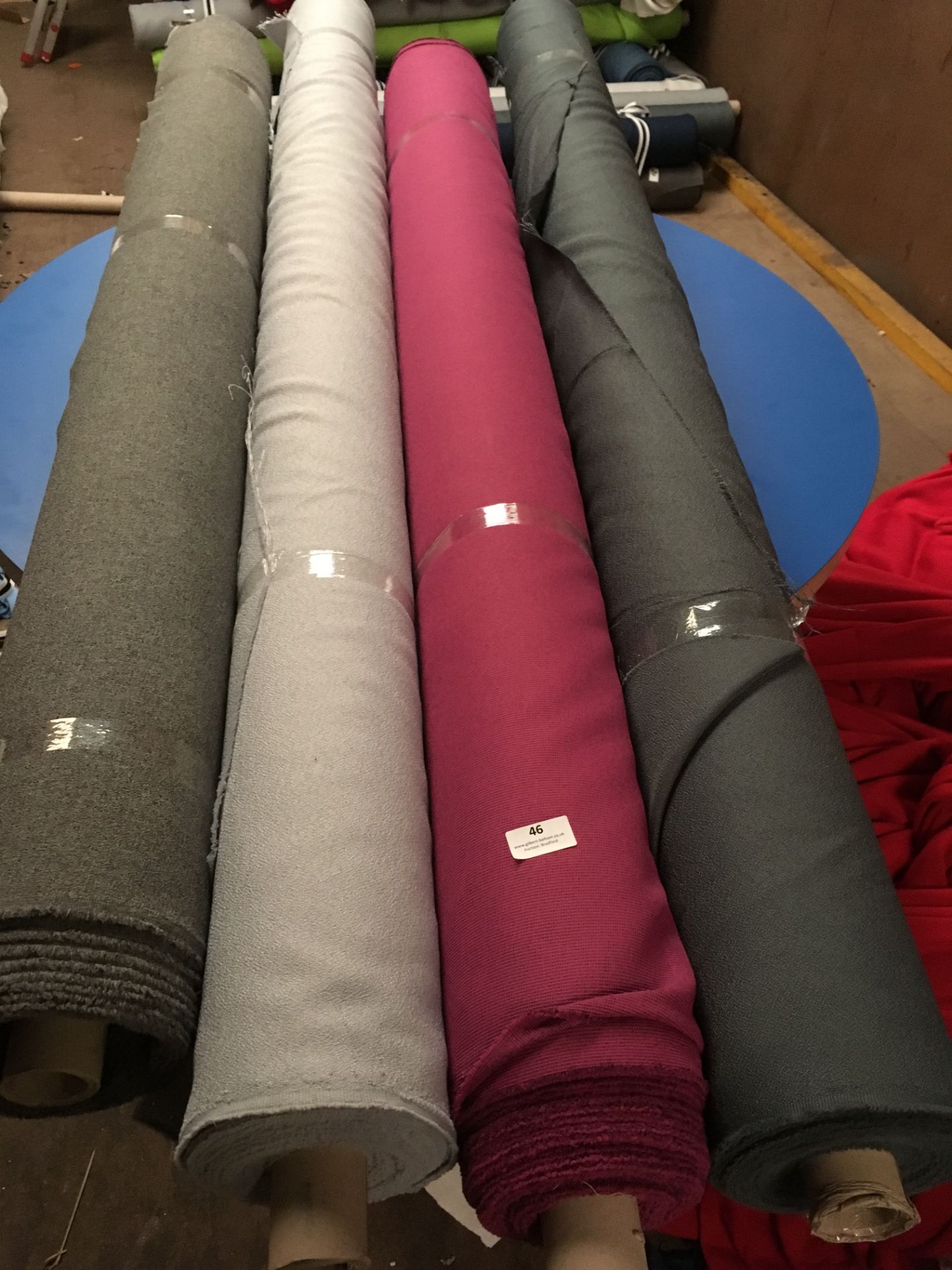 Four Rolls of Polyester Crepe Fabric Assorted Colours and Lengths