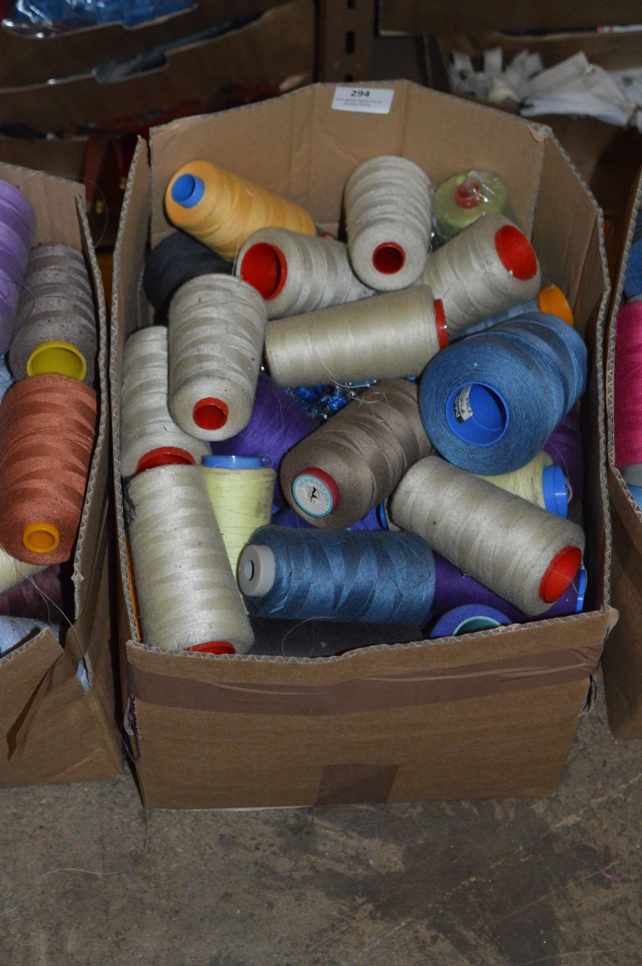 Box Containing Assorted Cones of 120 Cotton Thread